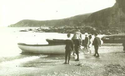 Rowing boats on Porthpean Beach